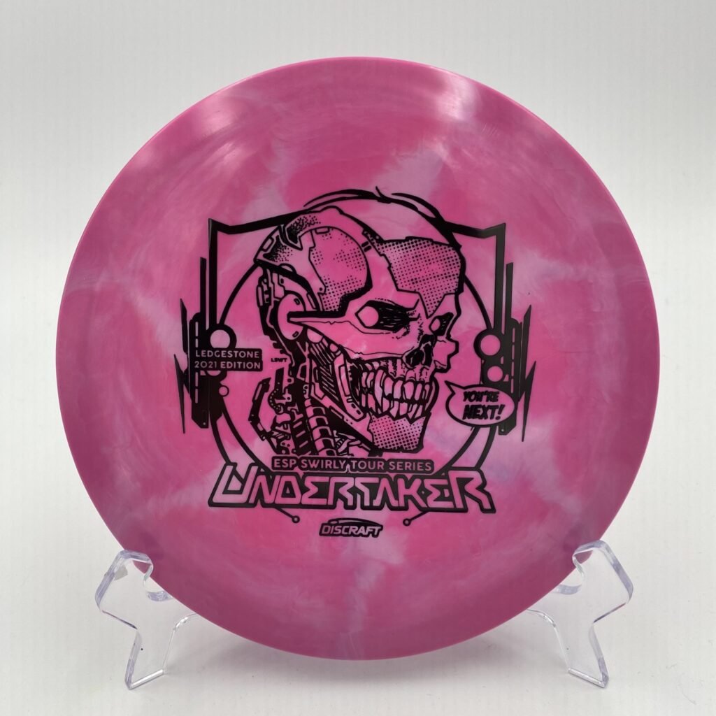 Top view of swirly green Discraft Undertaker in ESP plastic - 2021 Ledgestone Edition with unique foil stamp.