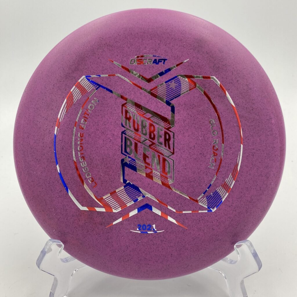 Top view of glowing green Discraft Roach in Rubber Blend plastic 2021 Ledgestone Edition with vibrant color accents.