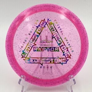 Top view of vibrant pink Discraft CryZtal Sparkle Raptor - 2022 Ledgestone Limited Edition with unique foil stamp.
