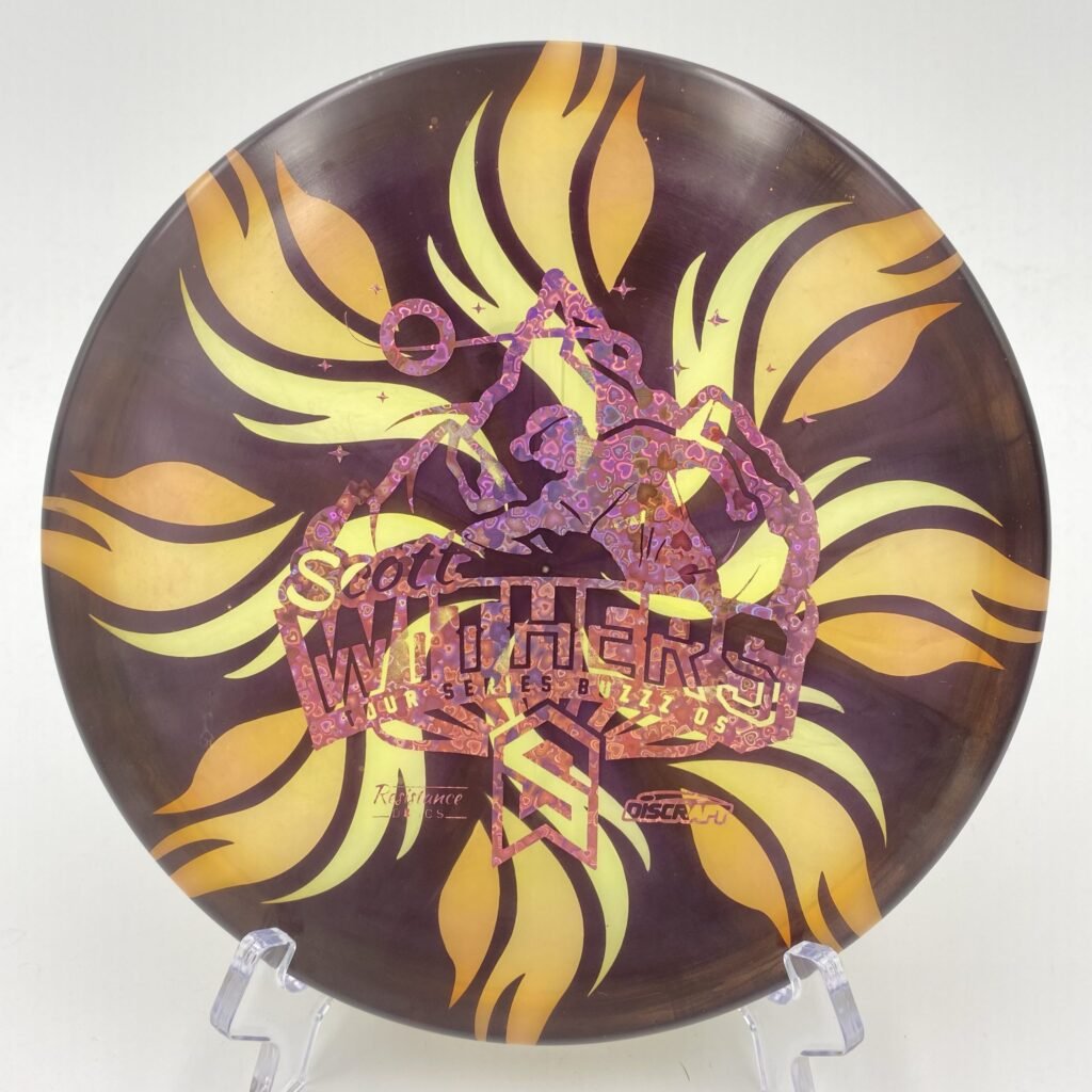 Top view of vibrant yellow Discraft Z Swirl Buzzz OS in premium plastic from the Scott Withers Tour Series.