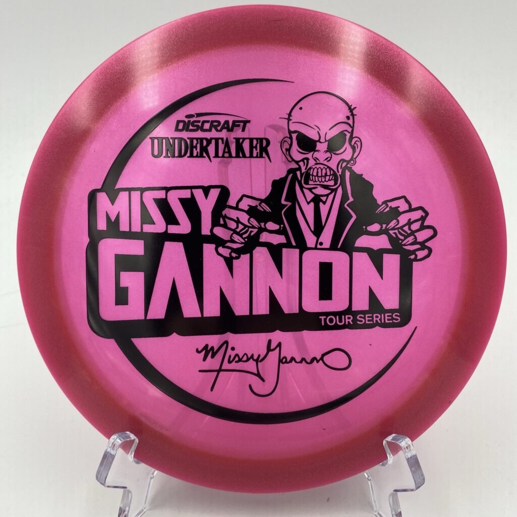 Top view of pink Discraft Undertaker in Metallic Z plastic - 2021 Missy Gannon Tour Series with a shiny finish.