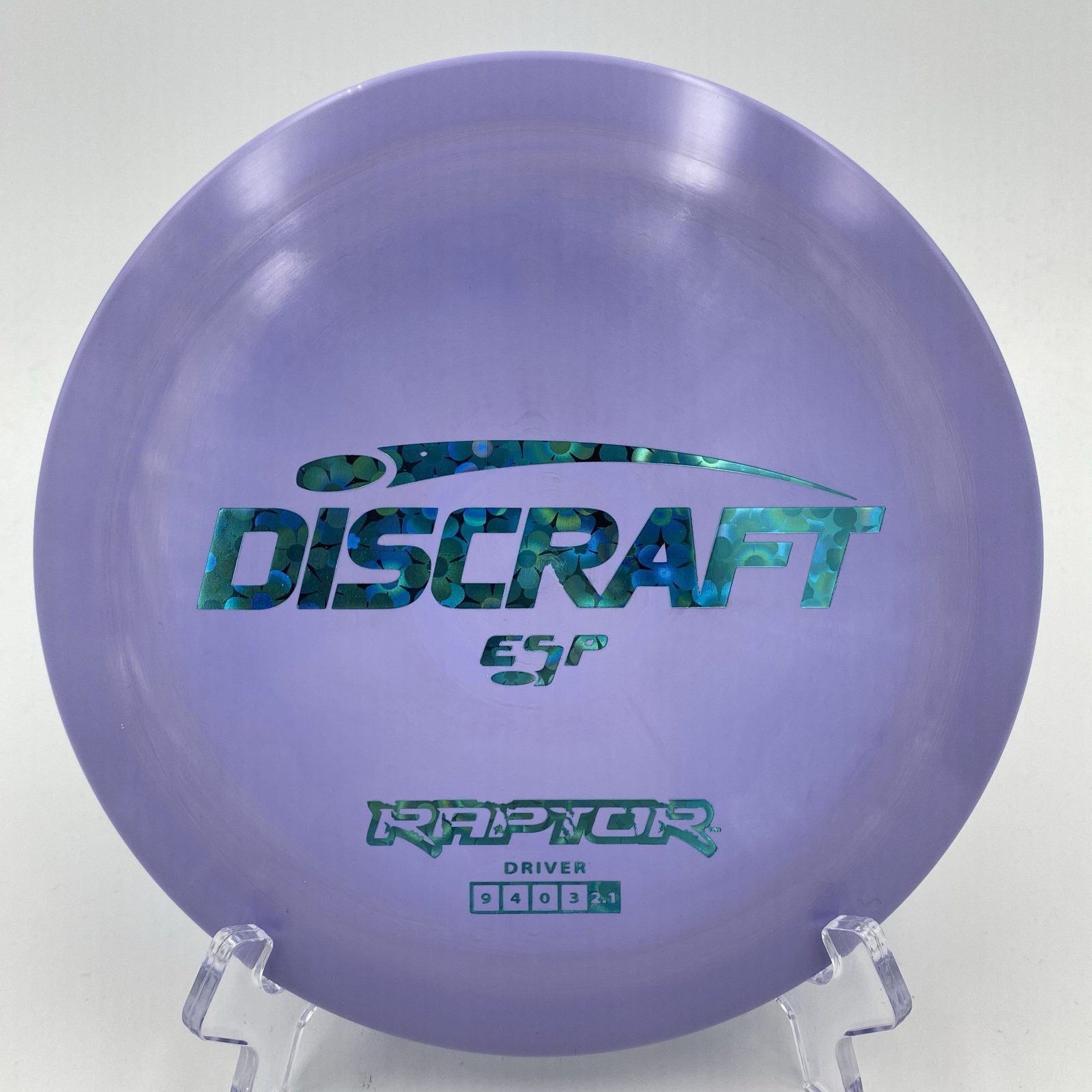 Top view of vibrant purple Discraft Raptor in ESP plastic with a unique swirl pattern.