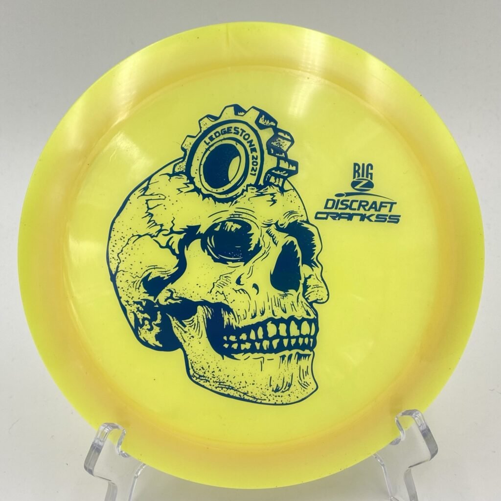 Top view of yellow Discraft Crank SS in Big Z plastic - 2021 Ledgestone Edition with detailed foil stamp.