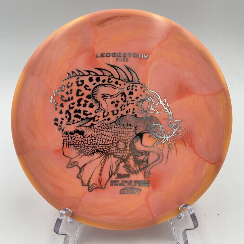 Top view of orange swirl Discraft Zone in ESP Swirl FLX plastic - 2022 Ledgestone Edition with unique foil stamp.