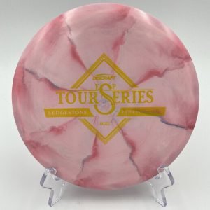 Top view of light pink Discraft Buzzz in ESP Swirl plastic - 2021 Ledgestone Tour Series with vibrant pink swirl.