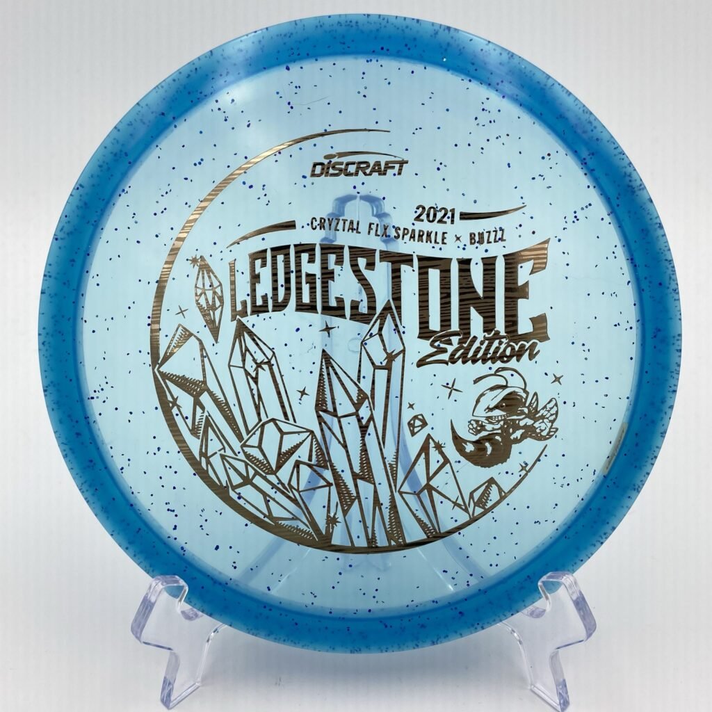 Main view of sparkling blue Discraft Buzzz in CryZtal FLX plastic - 2021 Ledgestone Edition with shimmering finish.