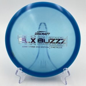 Top view of translucent Discraft Z Metallic FLX Buzzz in 2022 Ledgestone Edition with vibrant foil stamp.