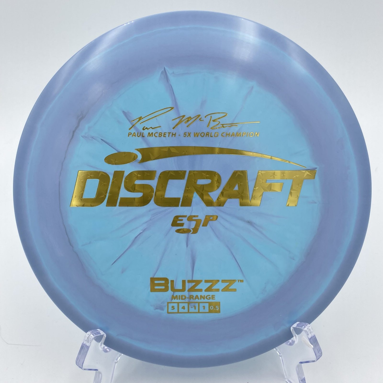 Top view of swirly green Discraft Buzzz in ESP plastic featuring 5x Paul McBeth signature.