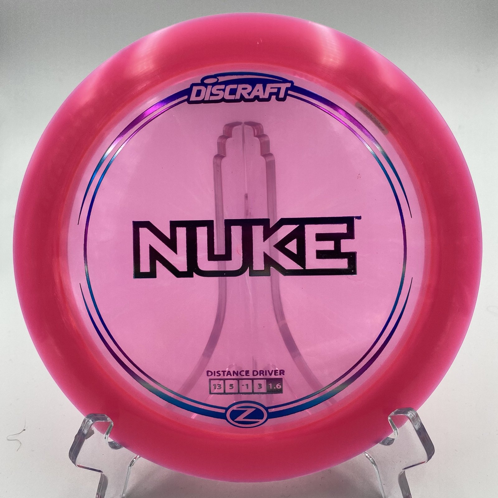 Top view of the solid green Discraft Nuke in Z plastic.