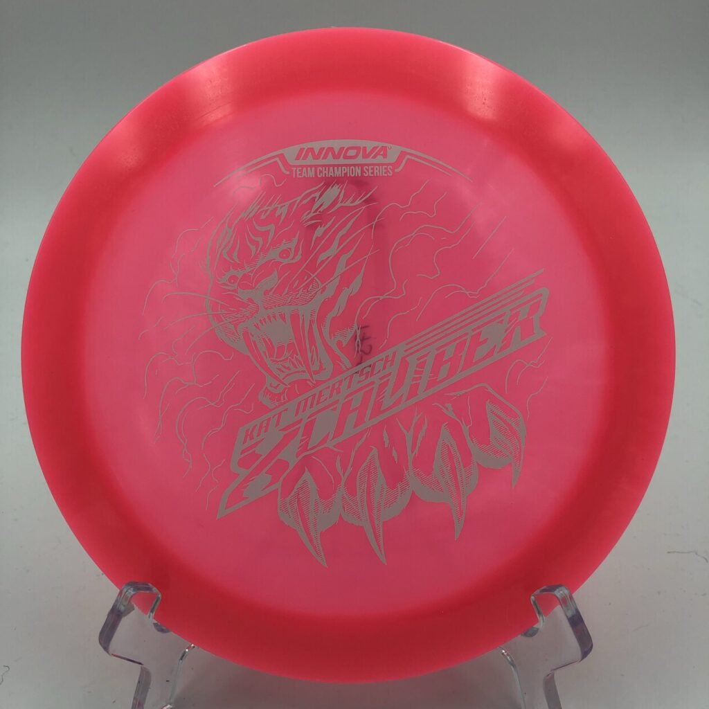 Top view of vibrant Champion Color Glow Innova Xcaliber in 2022 Tour Series plastic.
