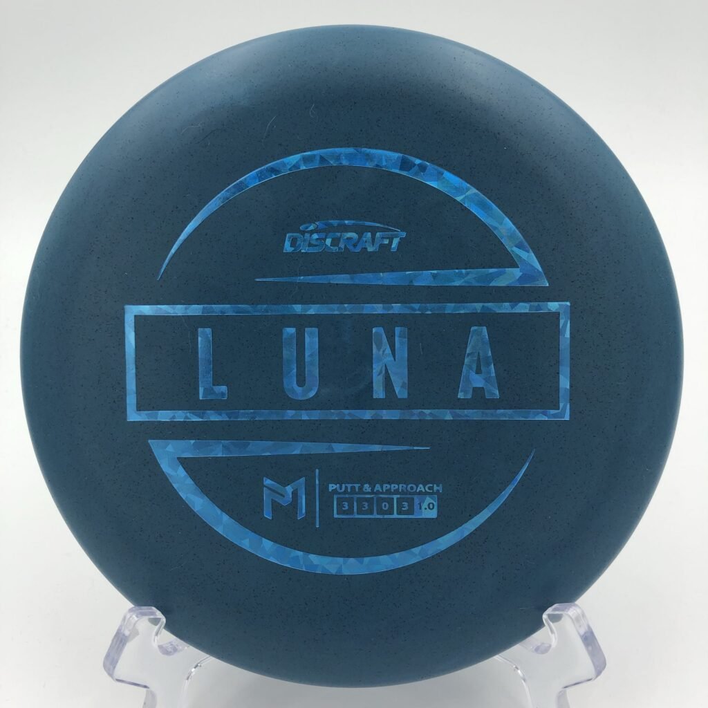 Top view of the vibrant Discraft Luna in 6x Paul McBeth blend plastic.