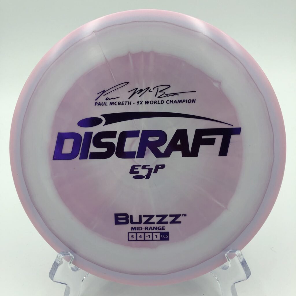 Top view of swirly blue Discraft Buzzz in ESP plastic - Paul McBeth 5x edition with unique swirl pattern.