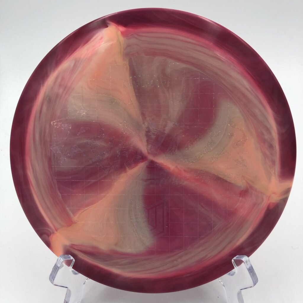 Top view of vibrant ESP Swirl Discraft Raptor in 2022 Paul Ulibarri Tour Series with eye-catching swirl patterns.