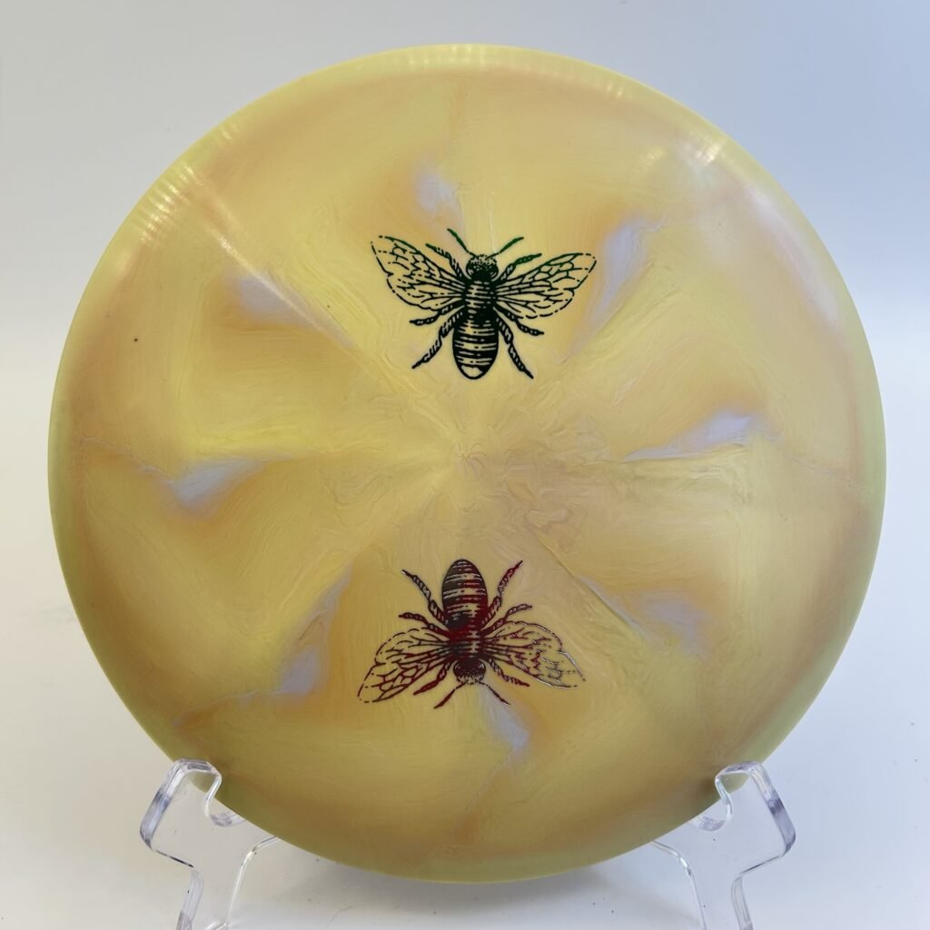 Translucent multi-colored Discraft ESP Buzzz SS - 2023 Great Lakes Open edition with intricate tooling.