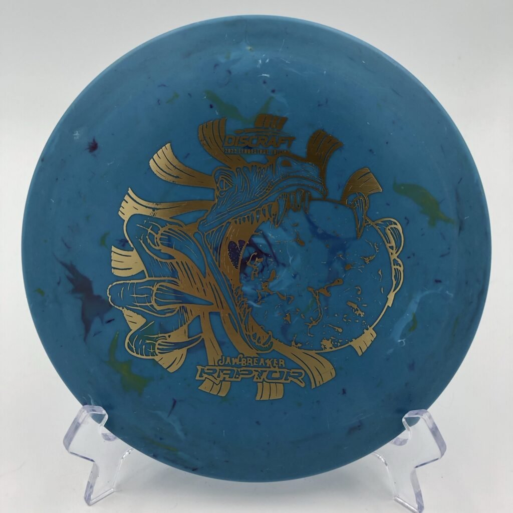 Top view of the colorful Discraft Jawbreaker Raptor in Ledgestone Edition plastic showcasing its stability and unique design.