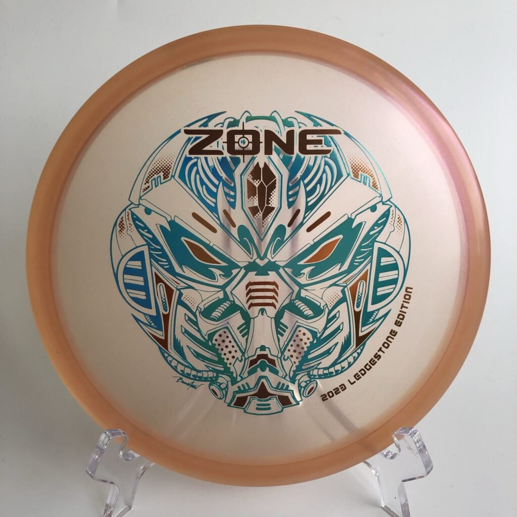 Top view of vibrant ColorShift Discraft Zone in Z plastic - 2023 Ledgestone Edition with unique color patterns.