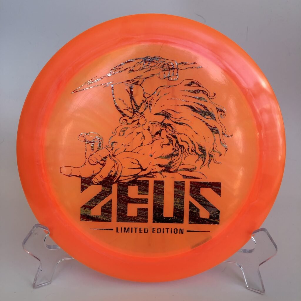 Top view of vibrant Discraft Z Zeus in Limited Edition plastic featuring Paul McBeth's signature.