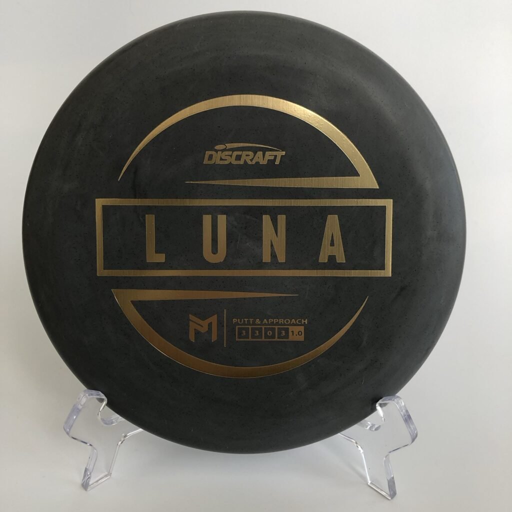 Top view of white Discraft Luna in standard plastic with Paul McBeth's signature.