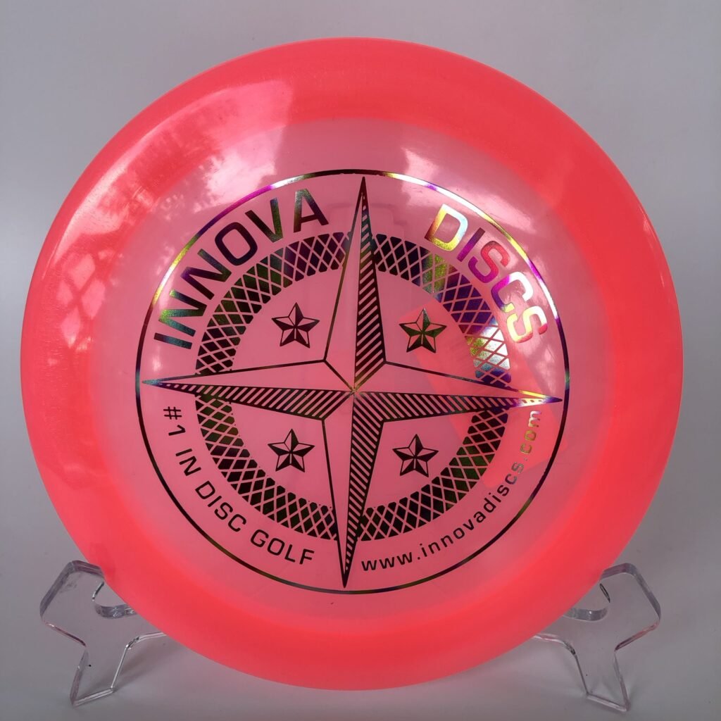 Top view of vibrant Innova Champion Firestorm disc in First Run plastic offering premium stability and excellent grip for distance throws.