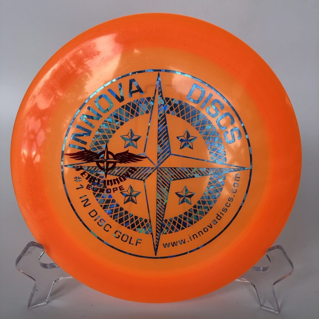 Top view of vibrant yellow Innova Firestorm in Champion plastic - First Run 'Team Innova Europe'.