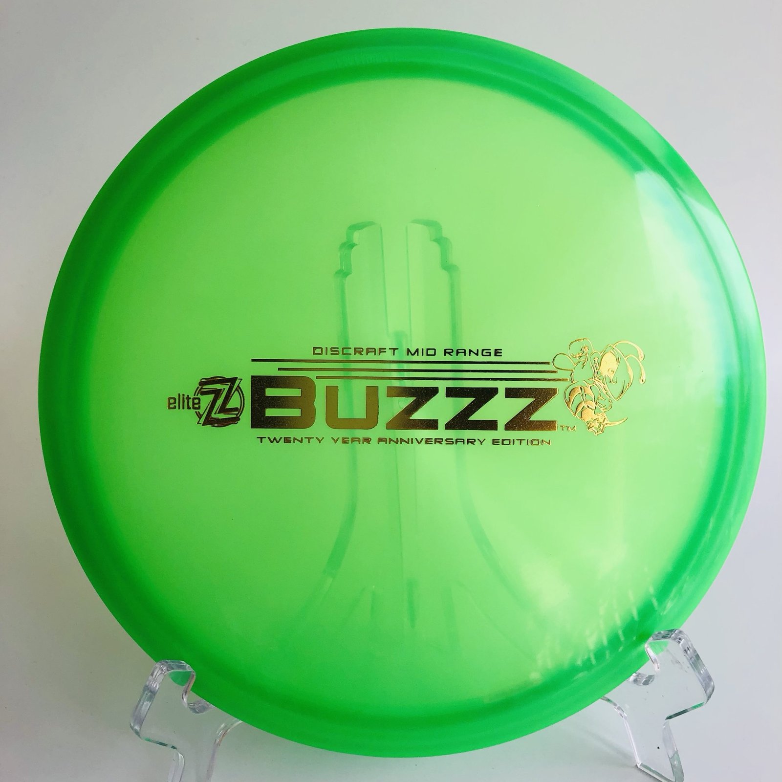 Top view of vibrant yellow Discraft Buzzz in Elite Z plastic - 20 Year Anniversary Edition.