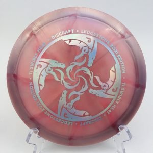 Top view of vibrant orange Discraft Titanium Heat in 2021 Ledgestone Edition with metallic foil stamp.