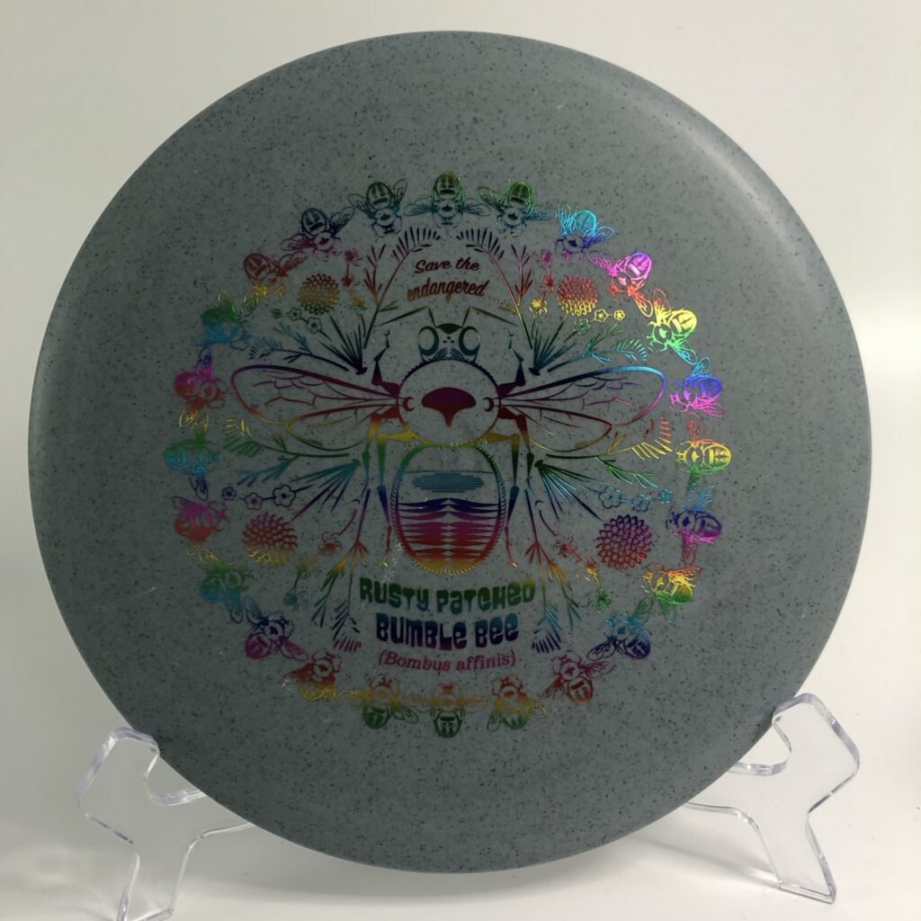 Top view of vibrant yellow Discraft Buzzz SS in Rubber Blend plastic 'Rusty Patched Bumble Bee' special edition.