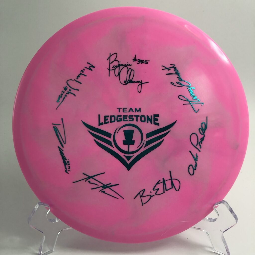 Top view of colorful swirl Discraft Buzzz in ESP plastic - 2021 Team Ledgestone Edition.
