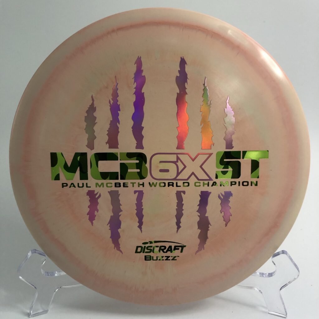 Main view of yellow Discraft ESP Buzzz in 6X Paul McBeth commemorative edition.