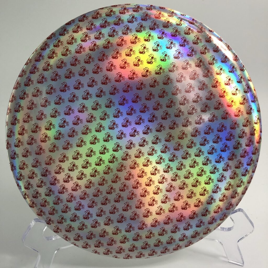 Top view of vibrant Discraft Buzzz in ESP plastic with superior stability and grip for precision shots.