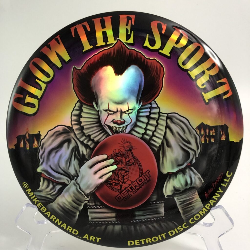 Top view of glowing Discraft Buzzz in ESP plastic with special Pennywise design - limited edition 11/50.