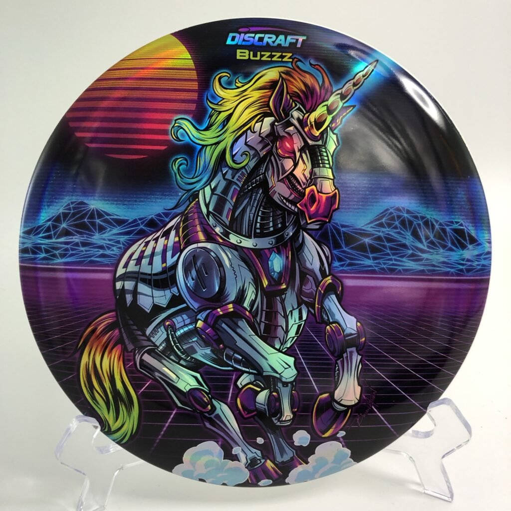 Top view of multicolored Discraft Buzzz in ESP plastic featuring the Robot Unicorn design.