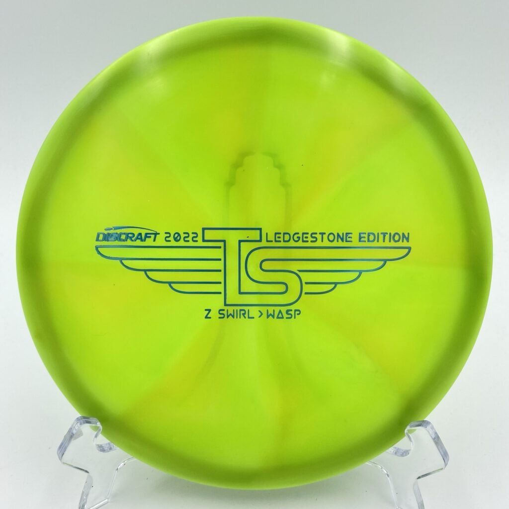 Top view of white Discraft Z Swirl Wasp in sturdy plastic - 2022 Ledgestone Edition with unique swirl design.