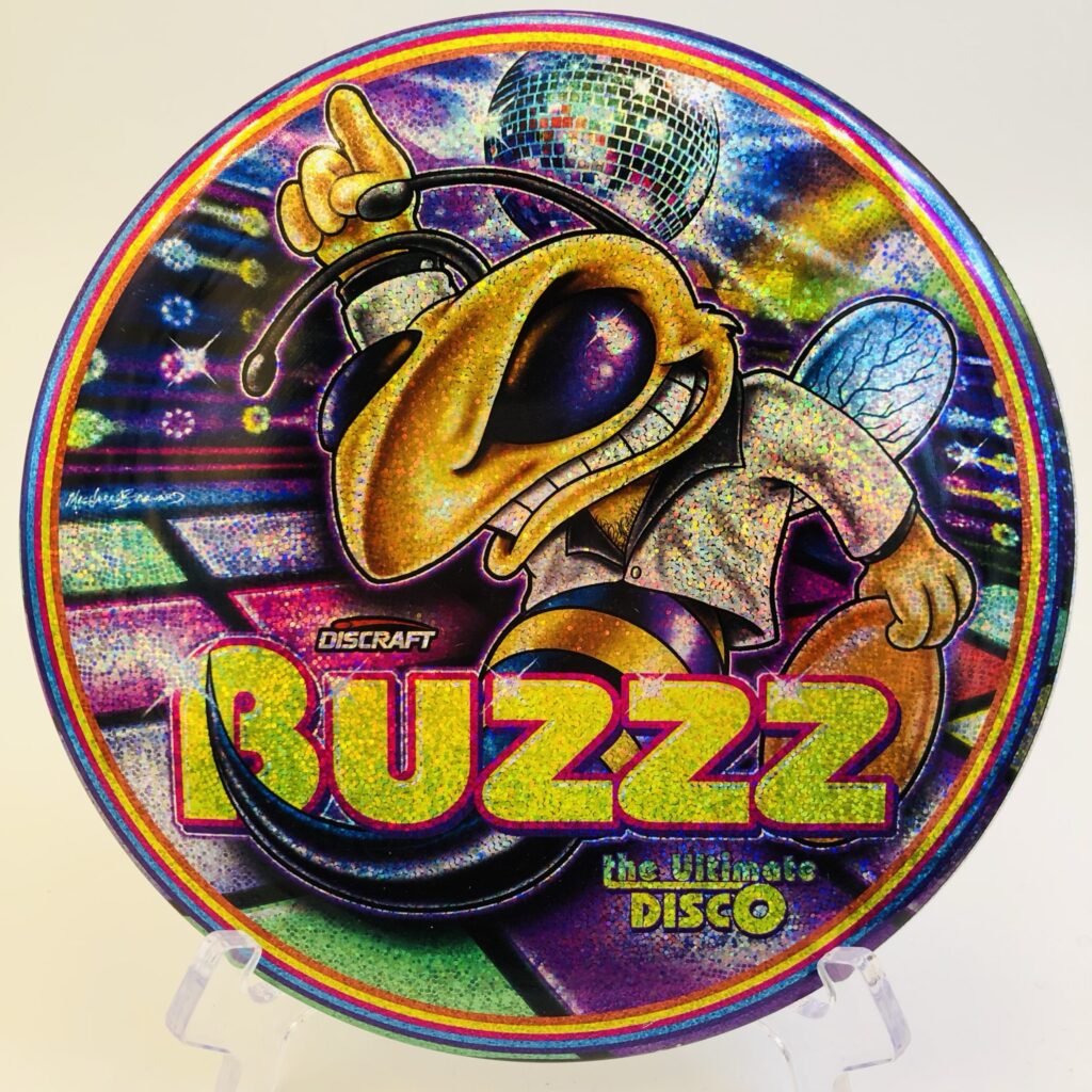 Discraft Buzzz in ESP plastic Ultimate Disco edition for enhanced stability and grip.