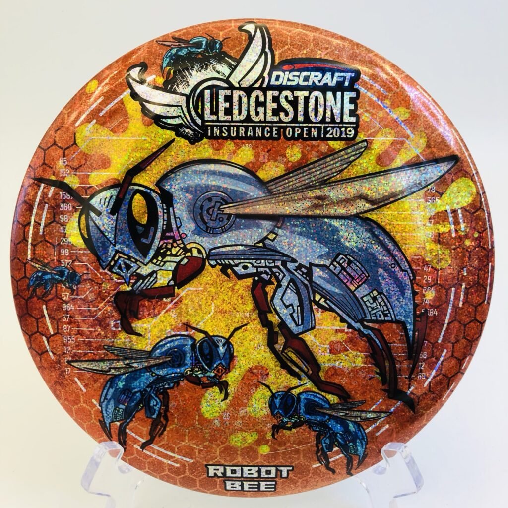 Discraft Buzzz in ESP plastic Ledgestone 2019 Robot Bee edition with unique artwork.