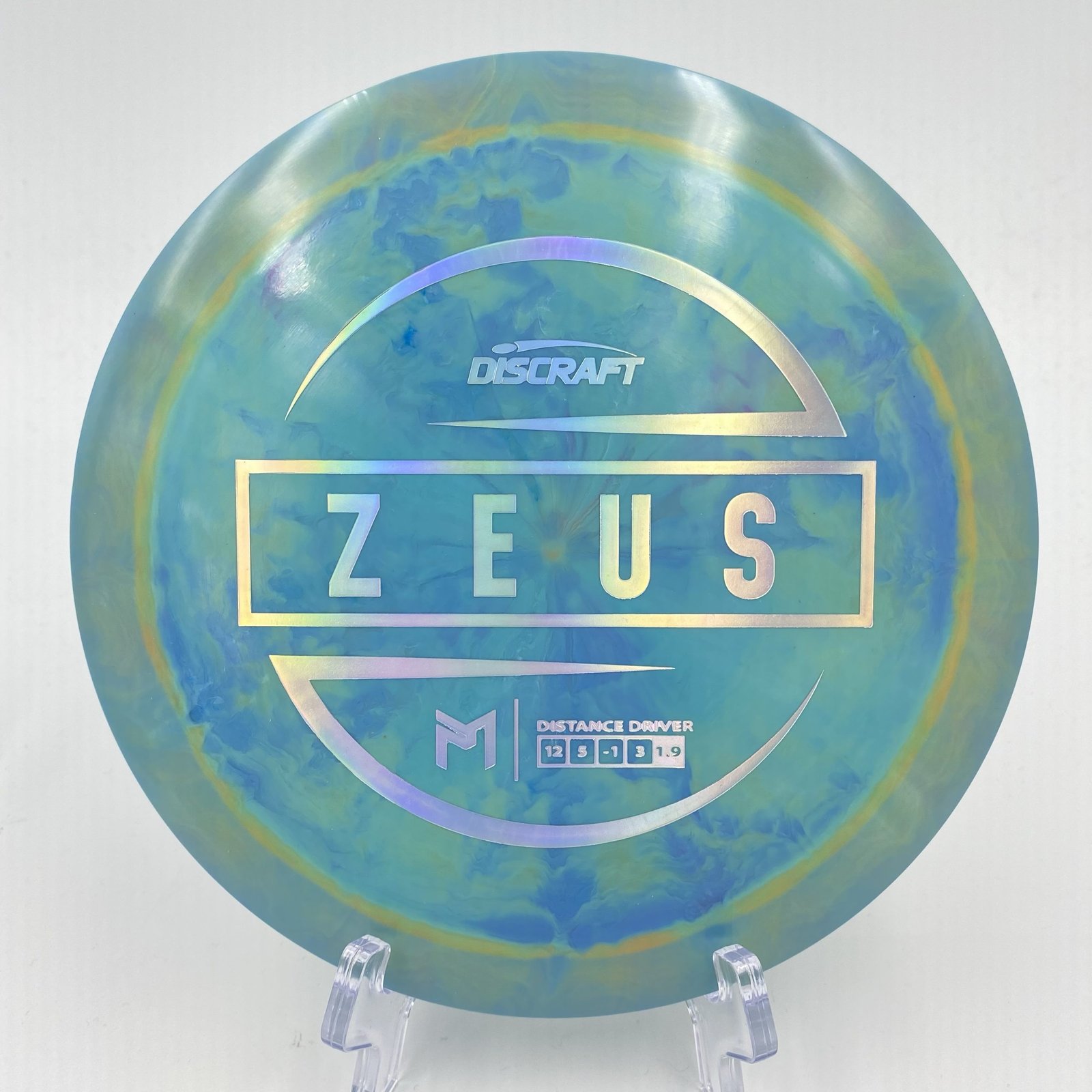 Main view of a vibrant Discraft Zeus in ESP plastic with a stunning design by Paul McBeth.
