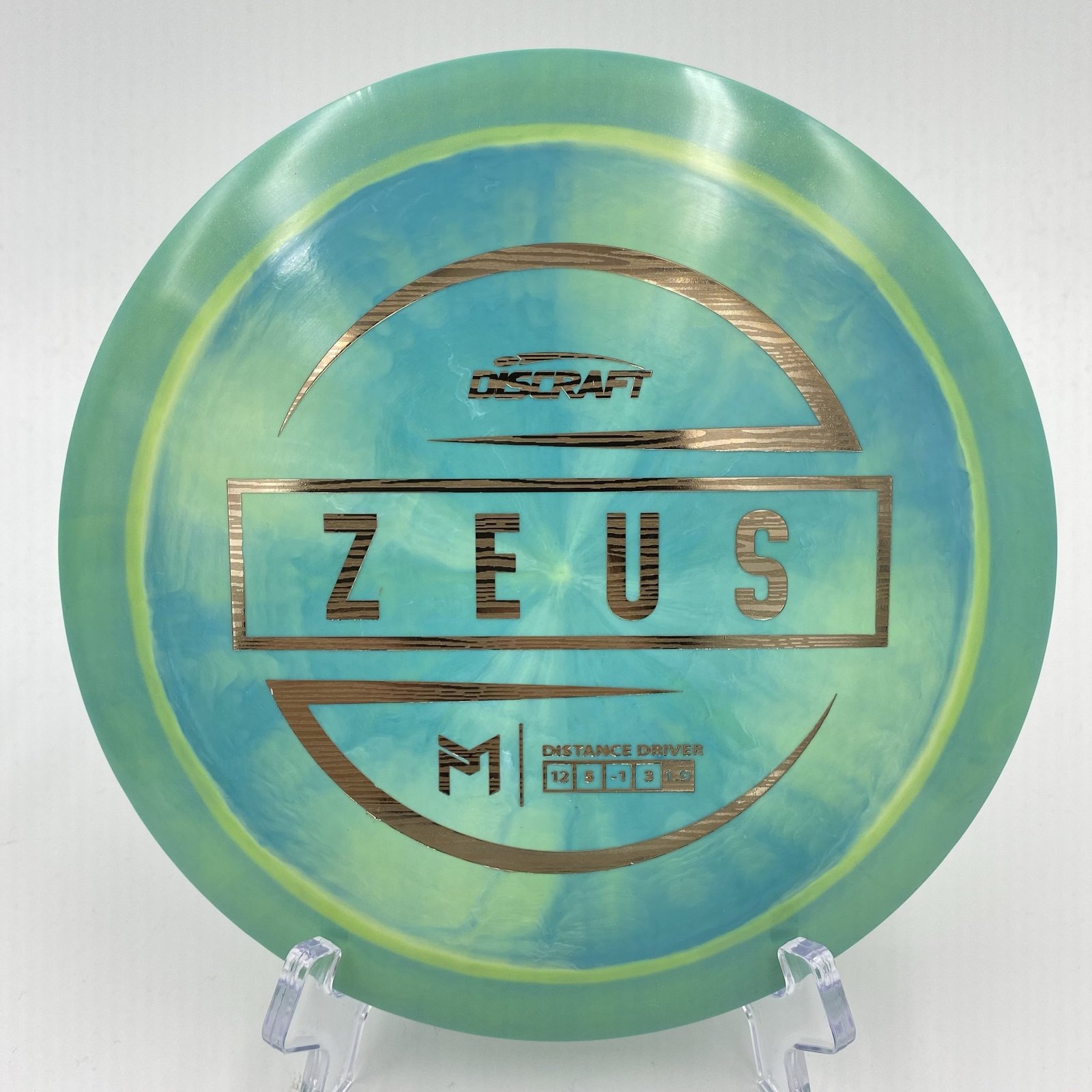 Top view of vibrant ESP Discraft Zeus in 170-172g plastic with unique Paul McBeth design.