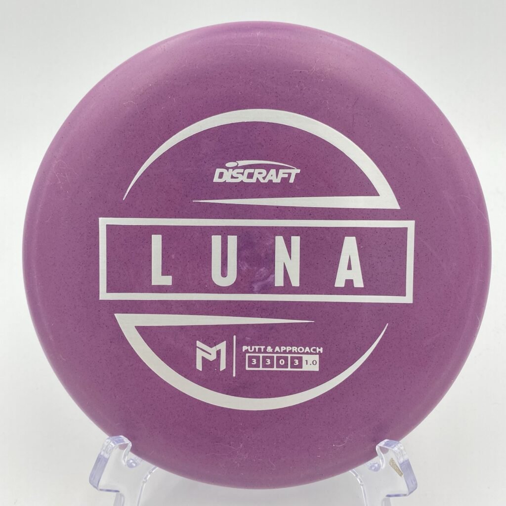Top view of white Discraft Luna in standard plastic featuring 6x Paul McBeth signature.