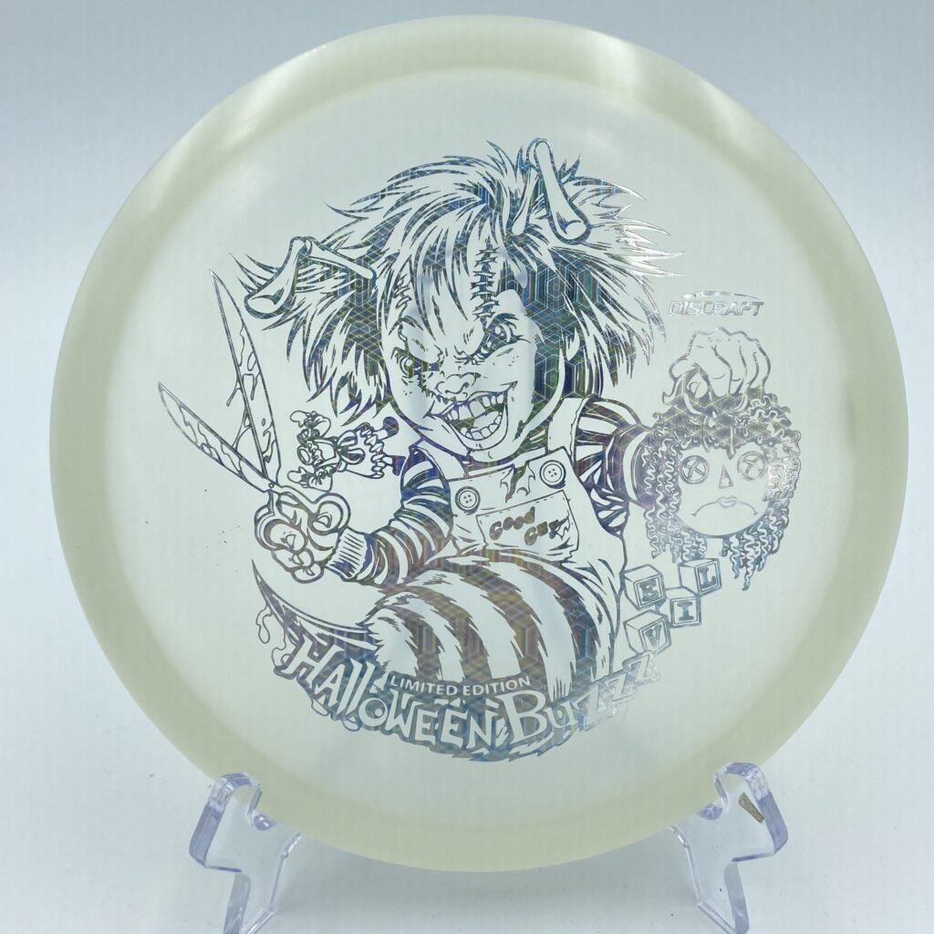 Top view of vibrant green Discraft Z Nite Glo Buzzz in Halloween 2022 'Killer Doll' edition plastic.