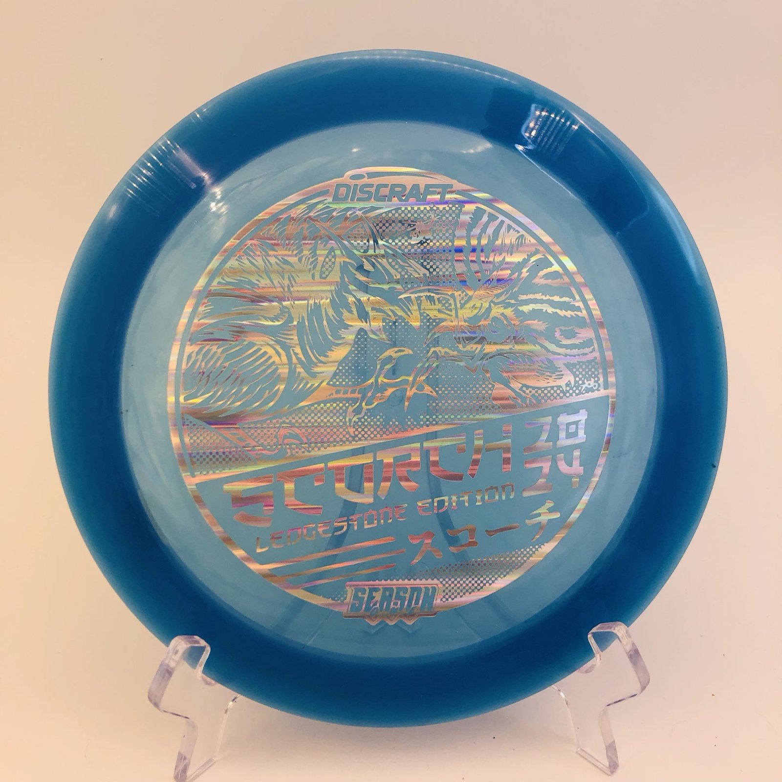 Discraft Scorch in CryZtal plastic 2024 Ledgestone Edition featuring Rodan and Mothra artwork.