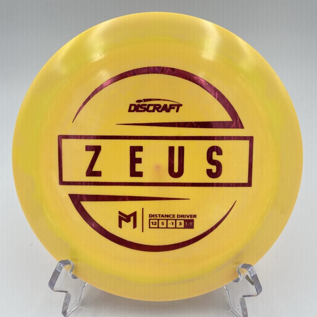 Top view of green Discraft Zeus in ESP plastic featuring 6x Paul McBeth signature.