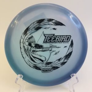 Top view of purple-blue Innova TeeBird in Champion plastic 2022 Tour Series with unique glow features.
