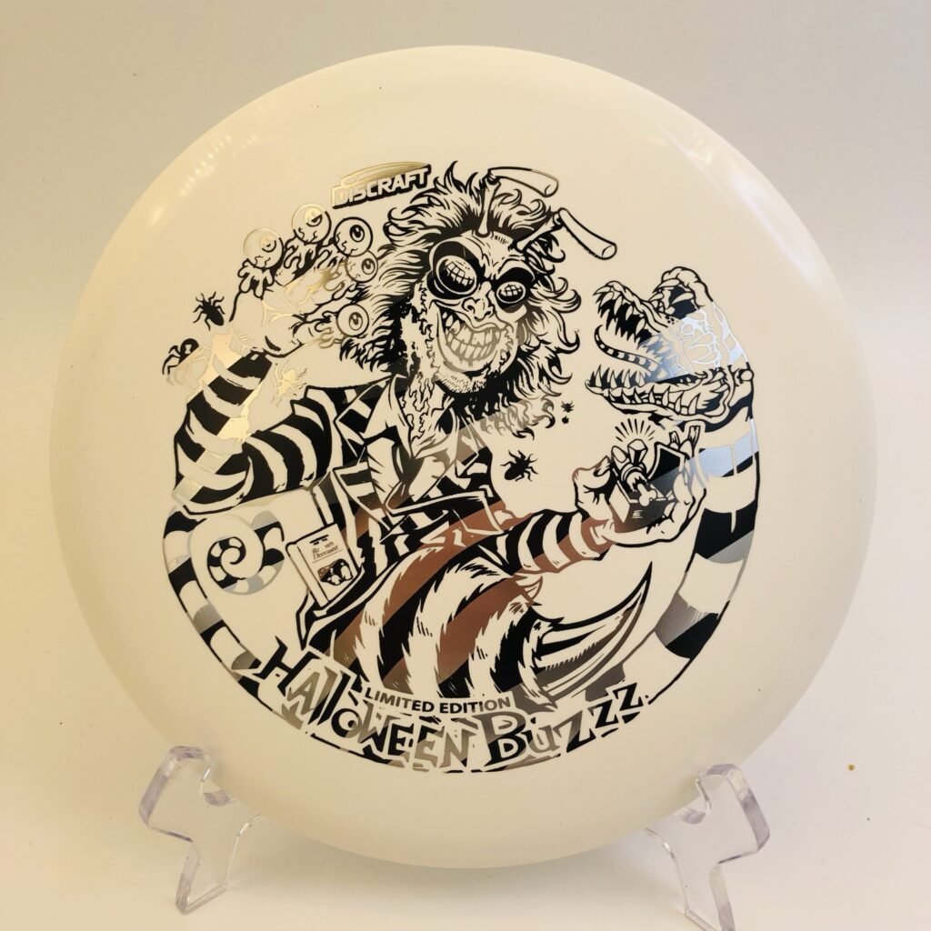 Translucent Discraft Glo Buzzz in glow plastic for the 2024 Halloween Buzzzjuice edition.
