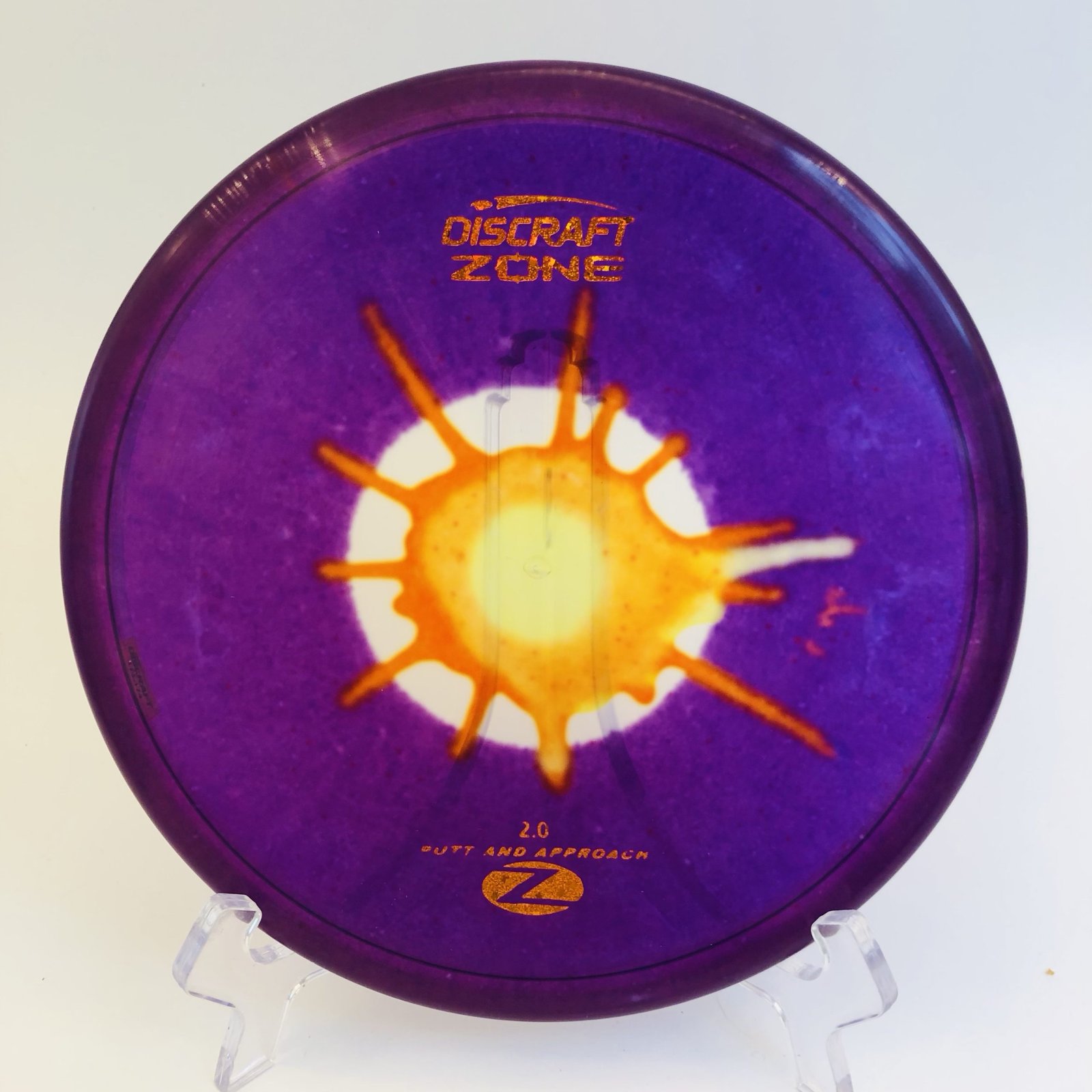 Discraft Zone in Z-Line plastic featuring vibrant fly dye design.
