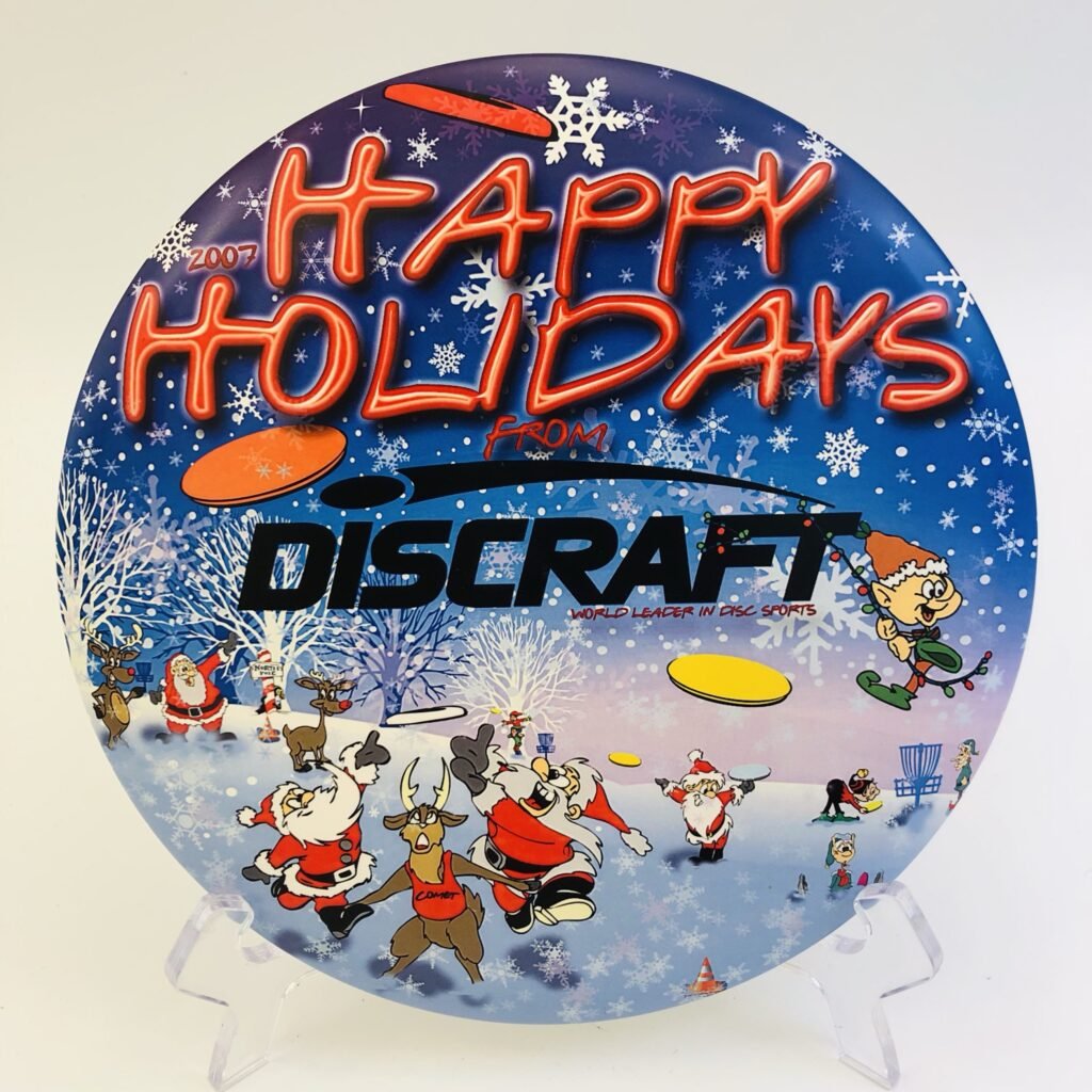 Discraft Buzzz in ESP plastic Happy Holidays edition with vibrant colors.