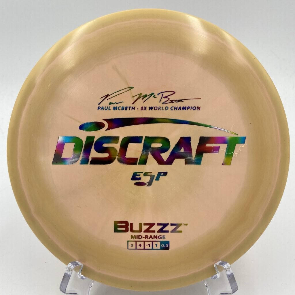 Top view of swirly translucent Discraft Buzzz in ESP plastic - Paul McBeth 5x edition.