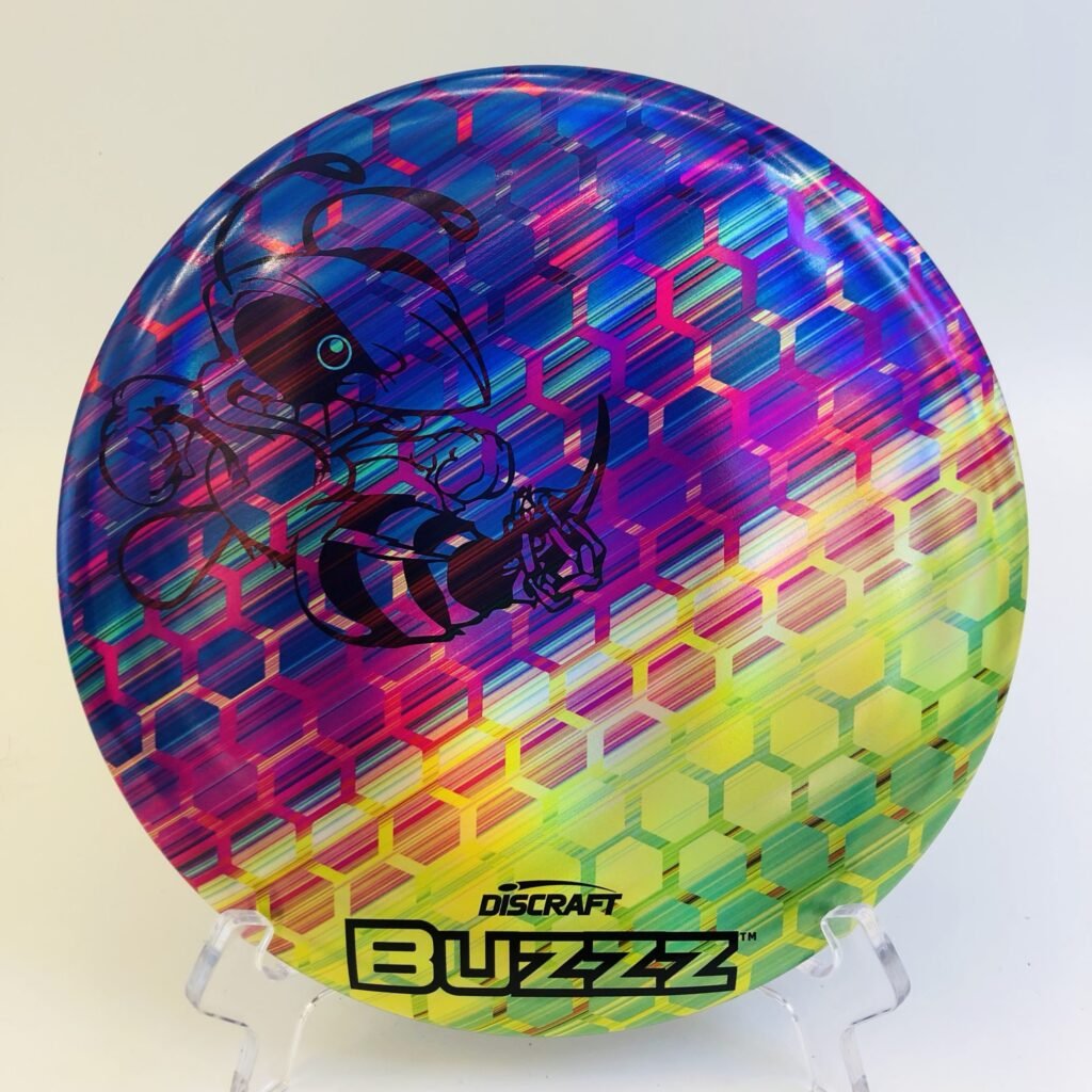 Discraft Buzzz in ESP plastic - Honeycomb Multi FullFoil edition with a striking black finish.