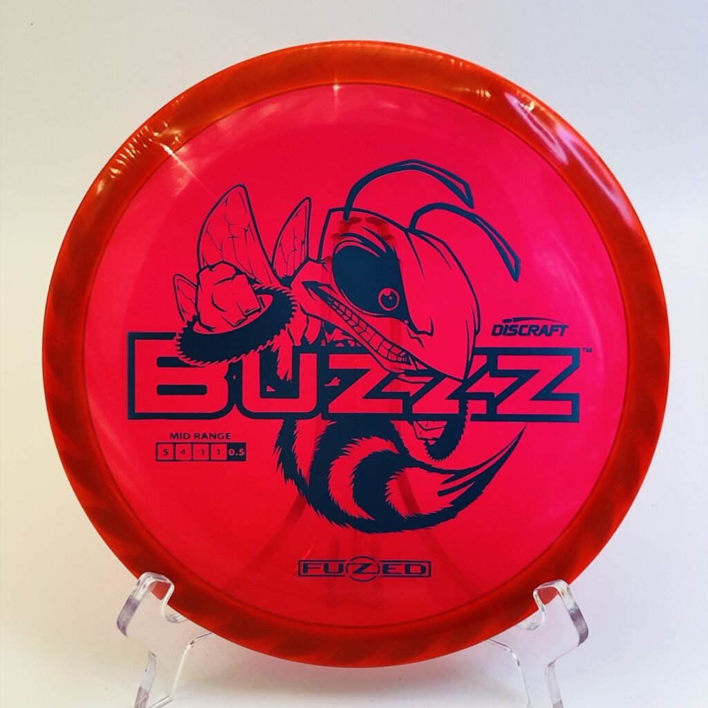 Discraft Buzzz in FuZed plastic with a distinctive saw pattern - perfect for those seeking a reliable flight path.