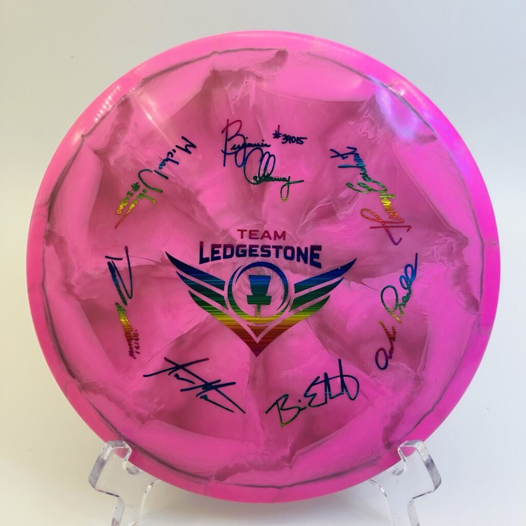 Discraft Buzzz in ESP plastic - 2021 Team Ledgestone Edition with vibrant swirl pattern.