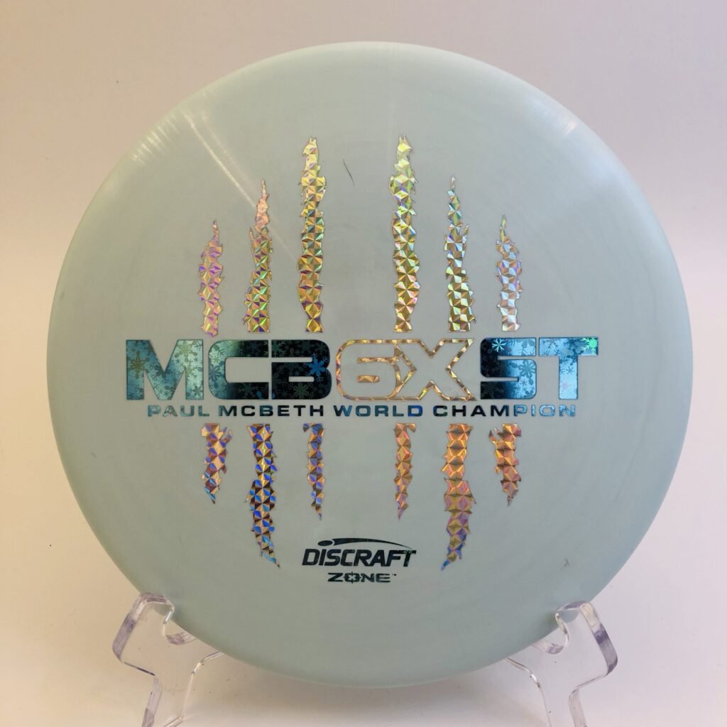 Discraft Zone in ESP plastic celebrating 6X Paul McBeth with vibrant coloring.